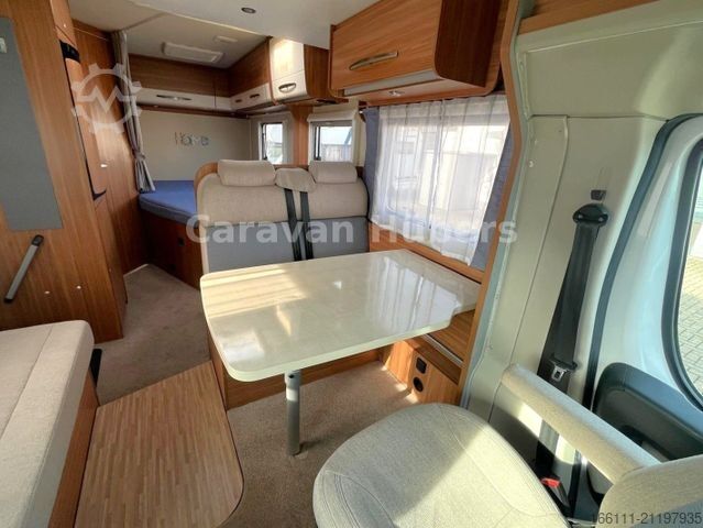 Semi-integrated camper CARADO T 348 - Hub/Festbett - Klima - Garage -