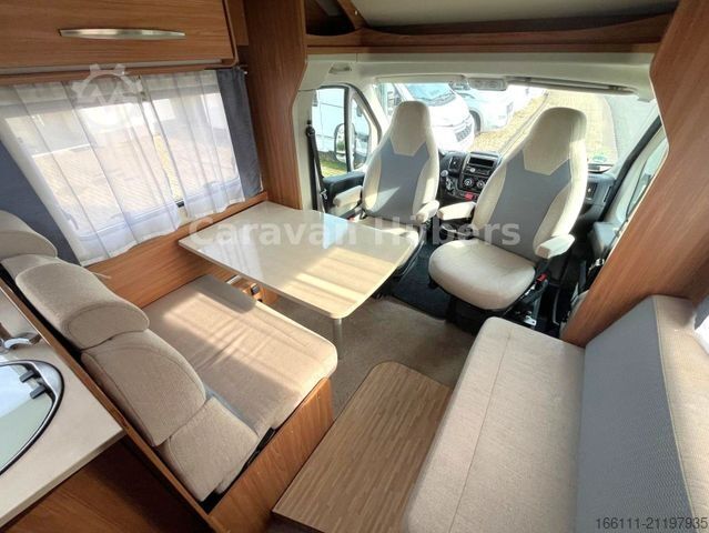 Semi-integrated camper CARADO T 348 - Hub/Festbett - Klima - Garage -