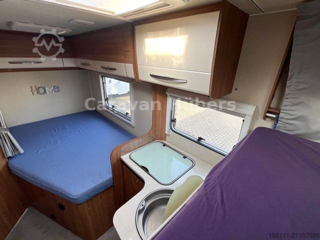 Semi-integrated camper CARADO T 348 - Hub/Festbett - Klima - Garage -