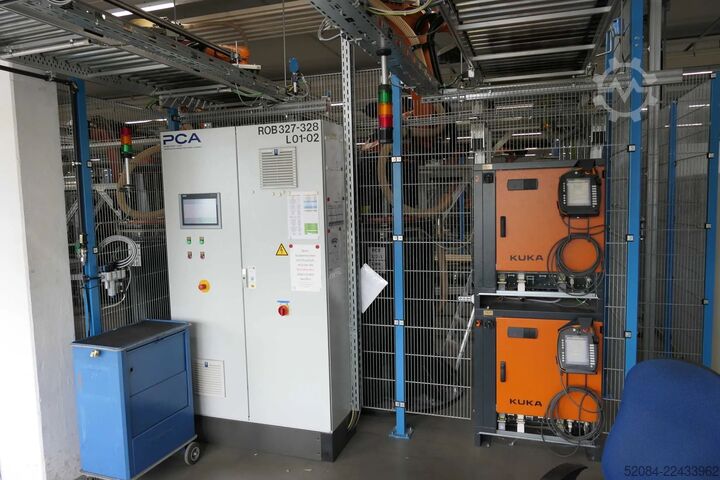 Paletizačná linka s robotmi KUKA KUKA Automatische Palettieranlage