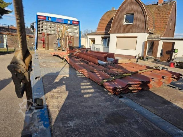 টাও ট্রাক MAN 26.400 TGX mit Baustoffplateau, geteilte Rampen