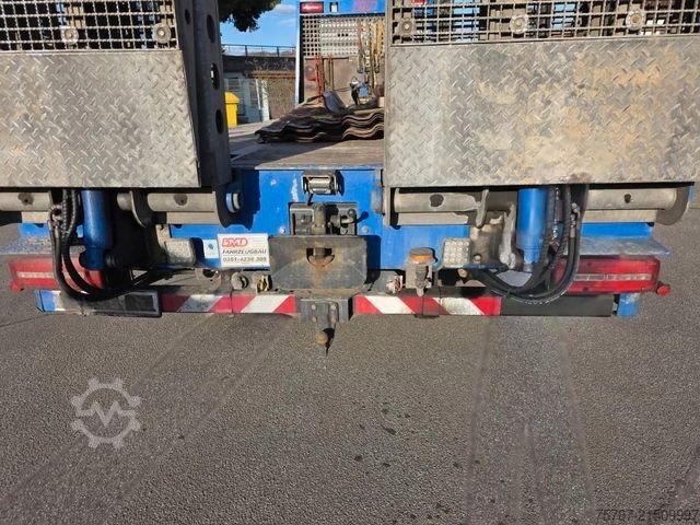 টাও ট্রাক MAN 26.400 TGX mit Baustoffplateau, geteilte Rampen