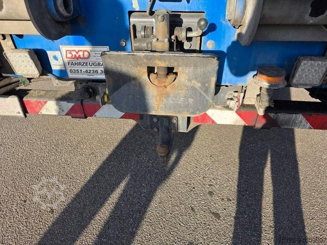 টাও ট্রাক MAN 26.400 TGX mit Baustoffplateau, geteilte Rampen