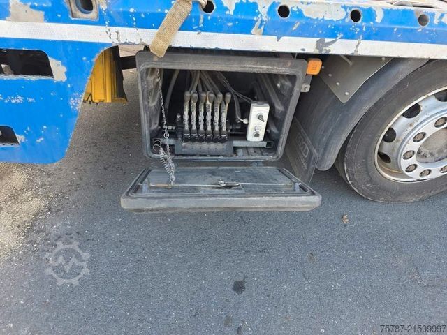 টাও ট্রাক MAN 26.400 TGX mit Baustoffplateau, geteilte Rampen