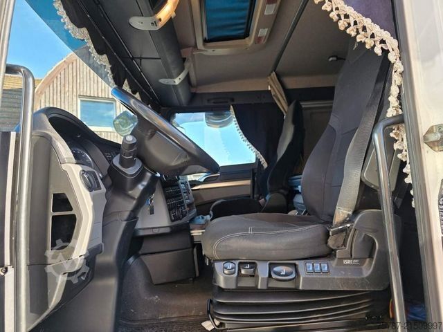 টাও ট্রাক MAN 26.400 TGX mit Baustoffplateau, geteilte Rampen