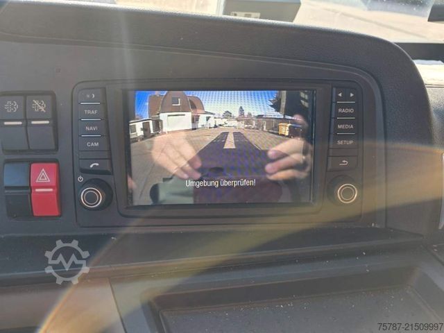 টাও ট্রাক MAN 26.400 TGX mit Baustoffplateau, geteilte Rampen