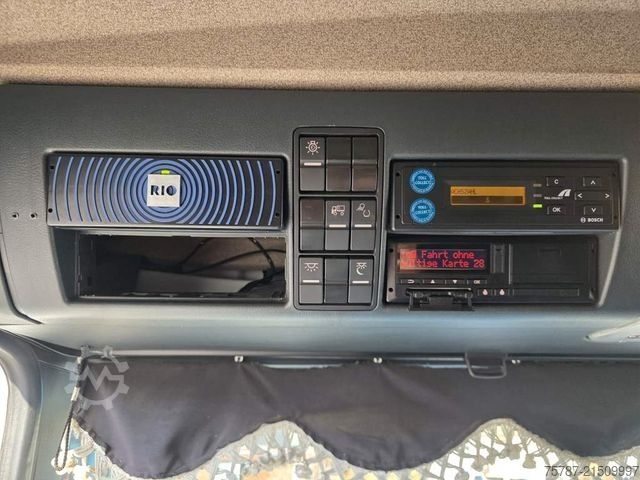 টাও ট্রাক MAN 26.400 TGX mit Baustoffplateau, geteilte Rampen