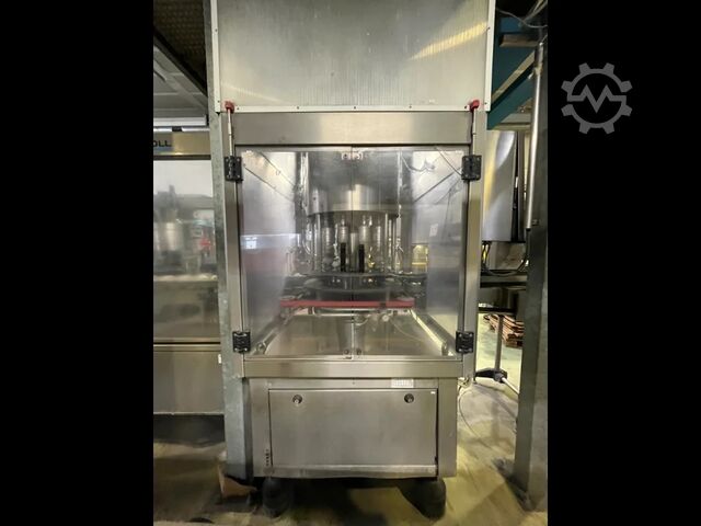 Taponadora AROL usada de 8 cabezales - 16000 BPH Arol 8 teste