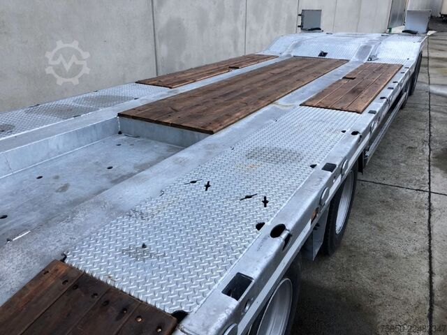 Reboque com plataforma rebaixada Möslein T 4 VB H1  neuer 4 Achs Tieflader hydraulischen Rampen