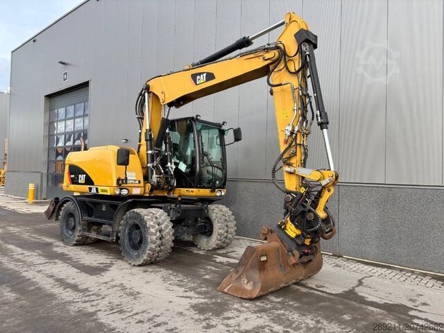 Колесный экскаватор CAT M 313 D