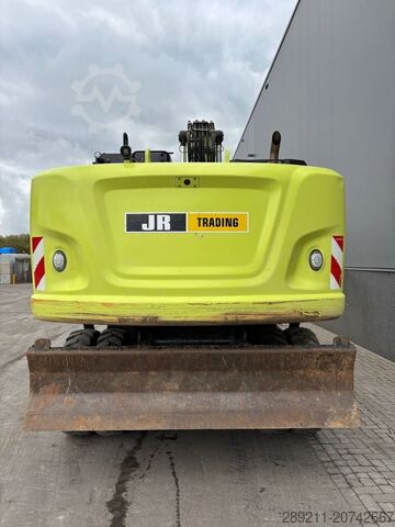 Колесный экскаватор CAT M 320 F