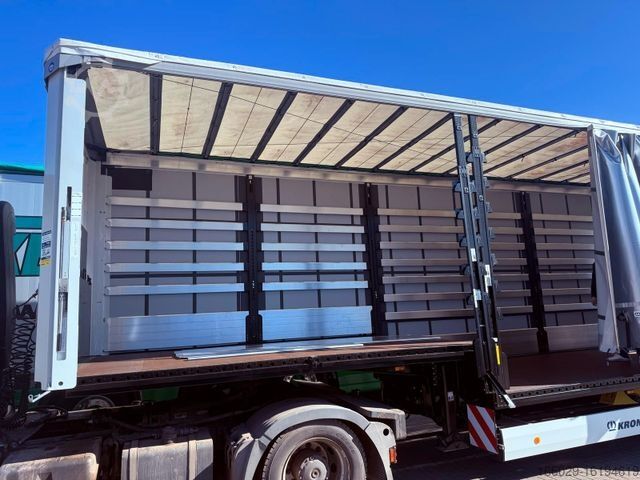 Відкритий напівпричіп з тентом KRONE SDP 27 Stufensattel Auflieger mit Spreizheck