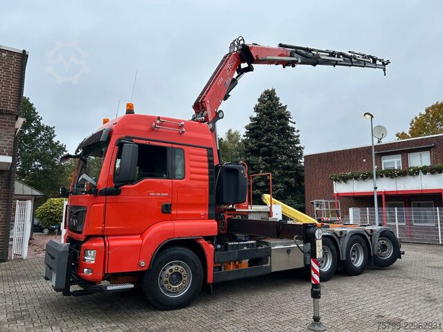 Кран, змонтований на вантажівці MAN 35.500 TGS Abroller mit Fassi F315RA.2.26 Kran
