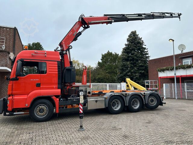 Кран, змонтований на вантажівці MAN 35.500 TGS Abroller mit Fassi F315RA.2.26 Kran