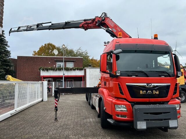 Кран, змонтований на вантажівці MAN 35.500 TGS Abroller mit Fassi F315RA.2.26 Kran