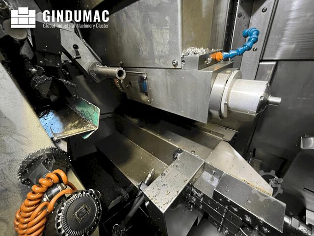 Máquina de torneado de tipo suizo TORNOS DECO 20A