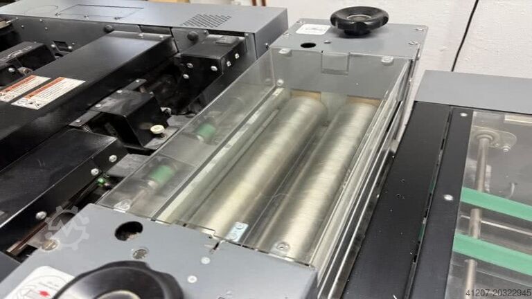 đối chiếu Duplo Bookletmaker system 5000/4000