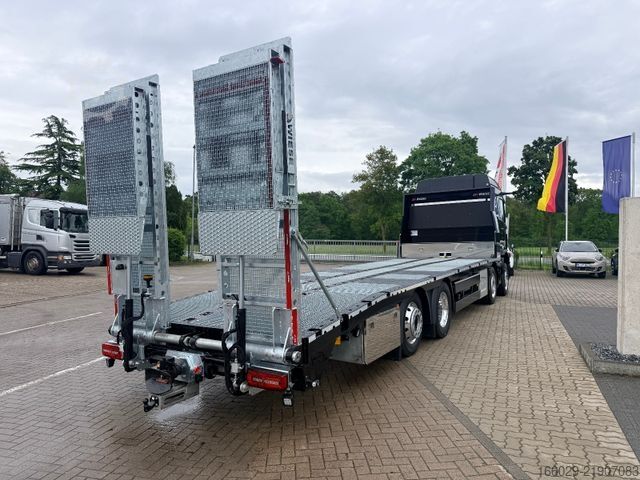 Camión de plataforma MAN Baumaschinen Maschinentransporter mit Rampen