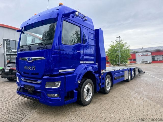 Grúa de remolque MAN Baumaschinen Maschinentransporter mit Rampen