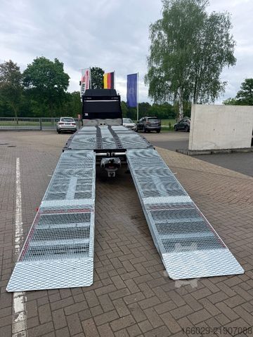 Grúa de remolque MAN Baumaschinen Maschinentransporter mit Rampen