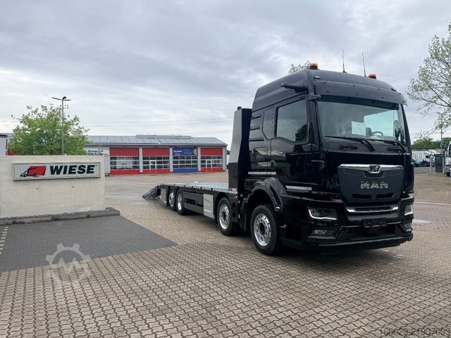 Camión para usos especiales MAN Baumaschinen Maschinentransporter mit Rampen