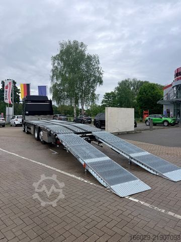 Camión para usos especiales MAN Baumaschinen Maschinentransporter mit Rampen