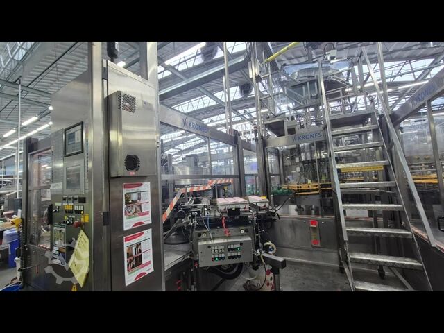 Used KRONES spirits filling line, roud glass 500 BPM - year 2003 Krones 