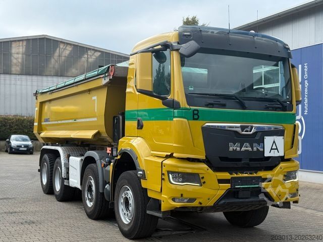 自卸卡车 MAN TGS 32.470 8x4 Muldenkipper Schmitz elekt. Plane