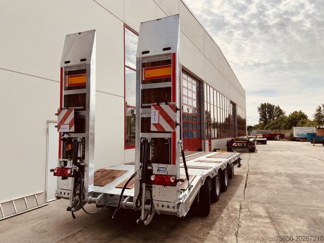 Remorcă cu platformă joasă Möslein TT 31  31 t GG Tridem- Tieflader 3 Achs, gelenktNeufahrzeug