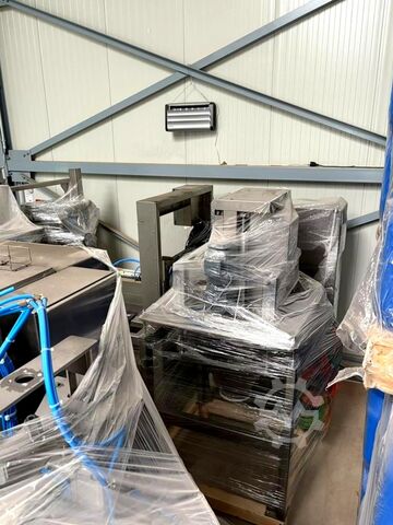 Pokunarverksmiðja Bottom Up Bagging System