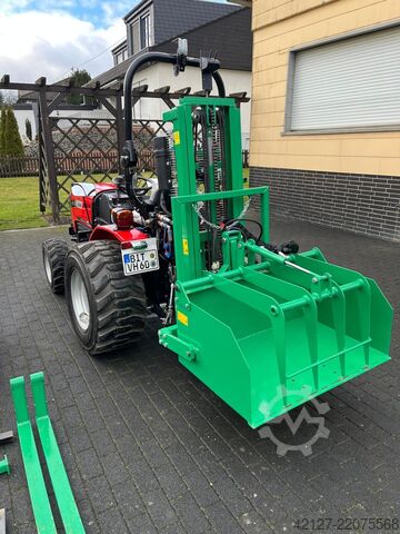Traktor mit Heckstapler + Bodenfräse Fieldtrac 918 D