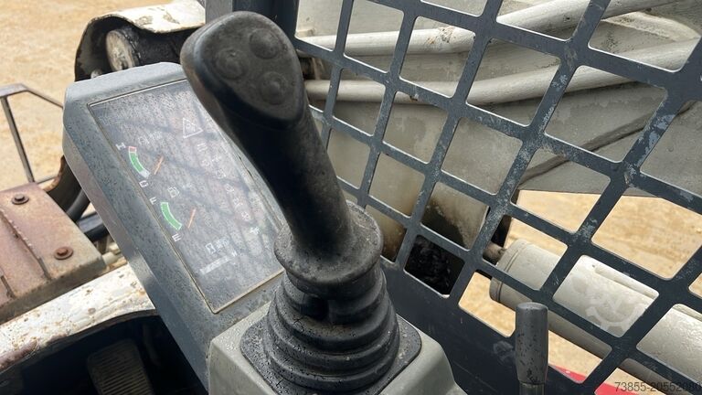 Kompaktlader auf Kette Takeuchi TL130 with forks and loader bucket