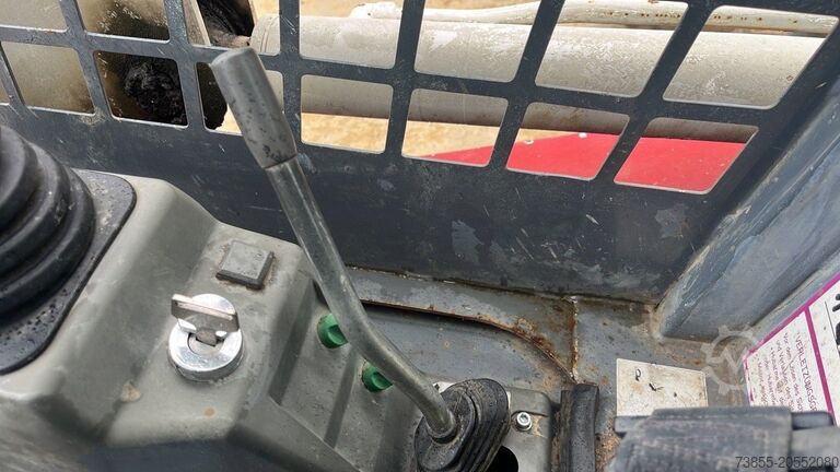 Kompaktlader auf Kette Takeuchi TL130 with forks and loader bucket