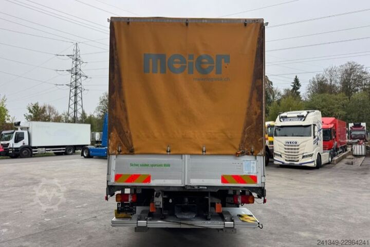 Flatbed truck with tarp MAN TGS 26.440 6x2