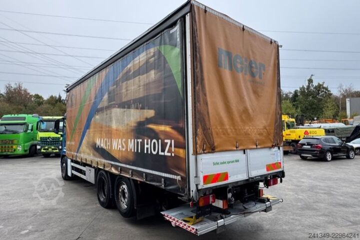 Flatbed truck with tarp MAN TGS 26.440 6x2