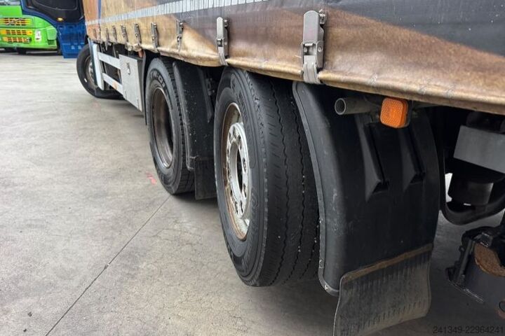 Flatbed truck with tarp MAN TGS 26.440 6x2