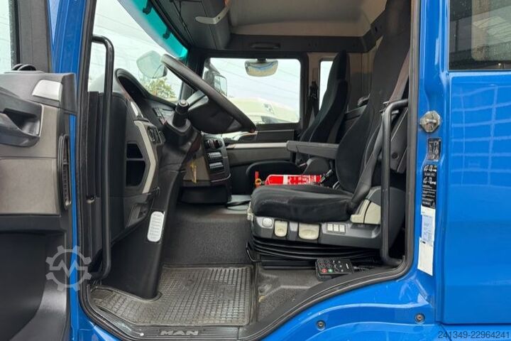 Flatbed truck with tarp MAN TGS 26.440 6x2