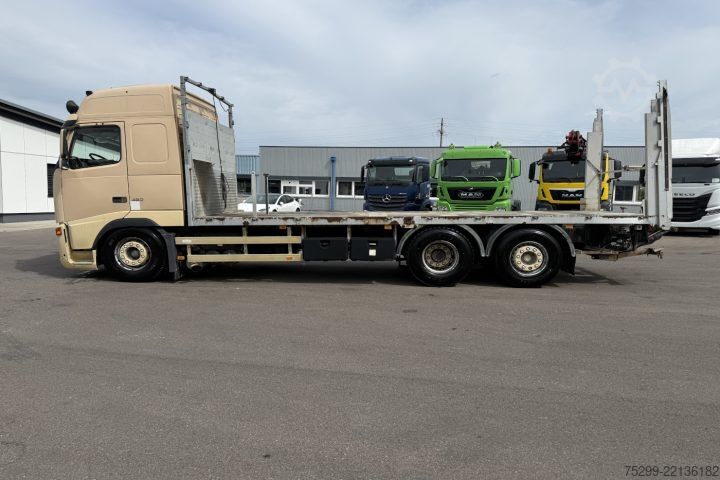 Вантажівка з відкритою платформою Volvo FH12-460 6x2 Brücke / Swiss-Vehicle