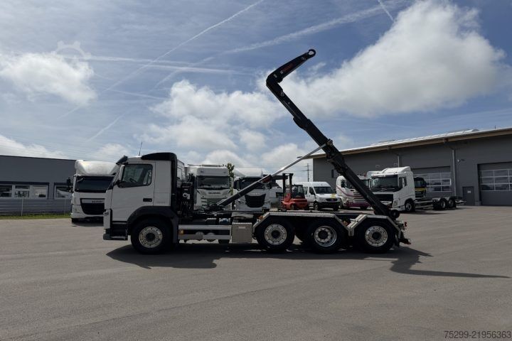 Ruloninė konteinerinė savivartis Volvo FM-500 8x2 Hiab / Swiss-Vehicle