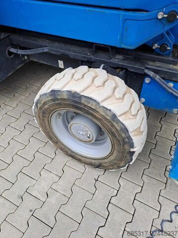 Podnośnik nożycowy Genie GS 3384 RT