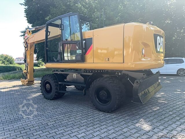 Excavator pe roți Caterpillar M320F