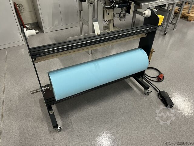 Automatisk tøyrullerevinder for offsettrykk Automatic cloth rewinder for offset printing machines Vliesstoff Kasper
