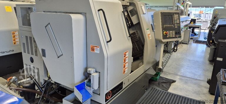 Токарный станок с ЧПУ швейцарского типа Hanwha STL38H