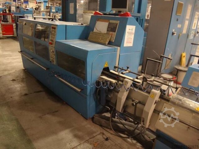 Encarteuse-piqueuse avec chargeur et trois coupe MÜLLER MARTINI Tempo