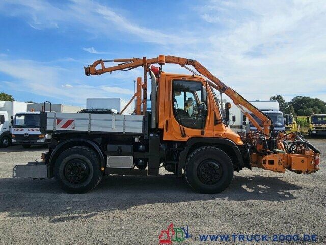 Sklápač Unimog U 400 Vario Pilot Mähtür + Mulag Mähkombination