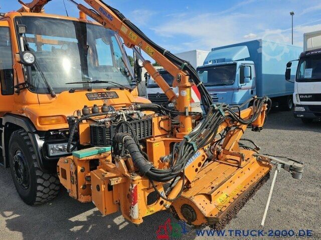 Sklápač Unimog U 400 Vario Pilot Mähtür + Mulag Mähkombination
