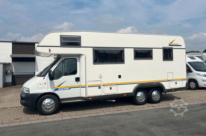 Альковний автокемпер EURAMOBIL A 695 VB - Etagenbetten - Garage - Markise - TV