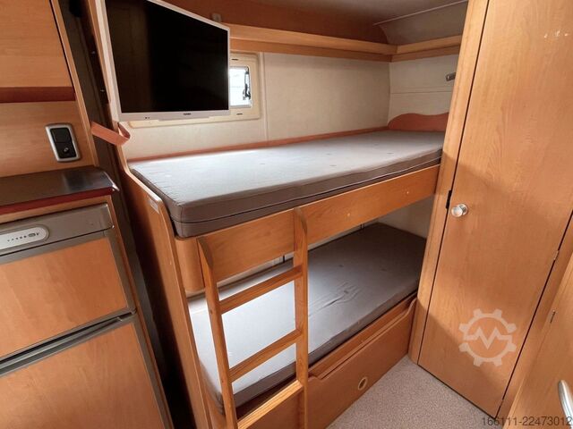 Альковний автокемпер EURAMOBIL A 695 VB - Etagenbetten - Garage - Markise - TV