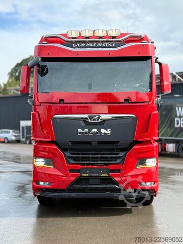 Truk pengangkut kayu MAN TGX 33.510 BL CH 6X4 mit TajfunLIV 150Z96,MIETE?