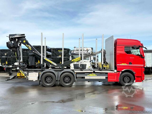 Truk pengangkut kayu MAN TGX 33.510 BL CH 6X4 mit TajfunLIV 150Z96,MIETE?